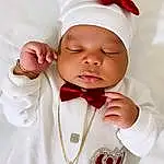 Child, White, Red, Baby, Head, Tradition, Toddler, Hair Accessory, Headgear, Smile, Fashion Accessory, Religious Item, Headband, Ceremony, Person, Headwear