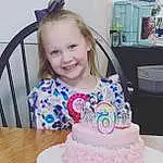 Smile, Food, Table, Blue, Cake Decorating Supply, Chair, Cake, Cake Decorating, Pink, Happy, Sugar Cake, Toddler, Birthday Cake, Baked Goods, Dessert, Event, Buttercream, Desk, T-shirt, Child, Person, Joy
