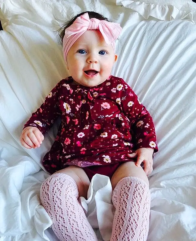 Child, Face, Pink, Baby, Toddler, Baby & Toddler Clothing, Head, Skin, Sitting, Pattern, Baby Products, Crochet, Cheek, Lip, Sleeve, Beanie, Design, Eyes, Person, Headwear