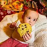 Child, Food, Yellow, Stollen, Panettone, Dessert, Toddler, Dish, Cuisine, Baked Goods, Baby, Christmas, Baking, Finger Food, Person