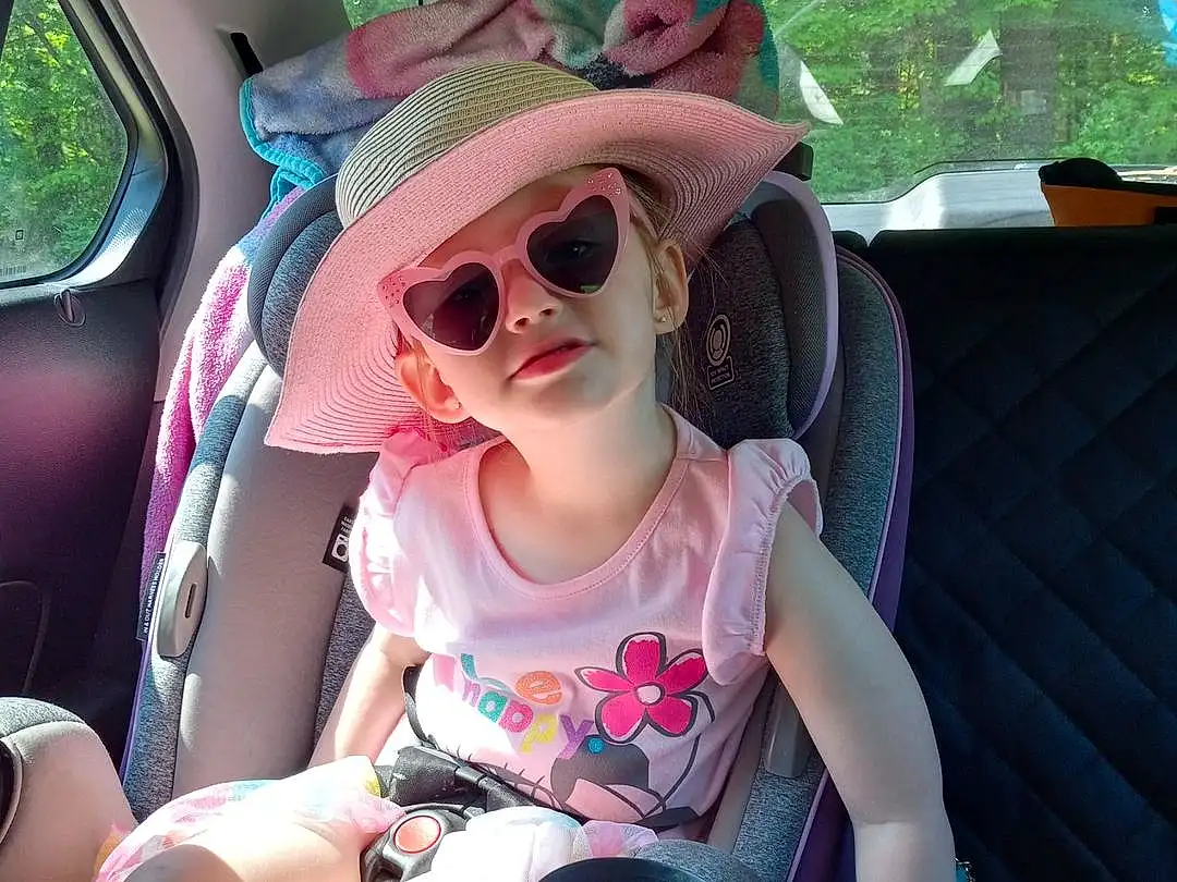 Vision Care, Goggles, Eyewear, Pink, Sunglasses, Vroom Vroom, Car, Toy, Vehicle Door, Summer, Toddler, Happy, Leisure, Automotive Design, Event, Fun, Hat, Auto Part, Family Car, Child, Person