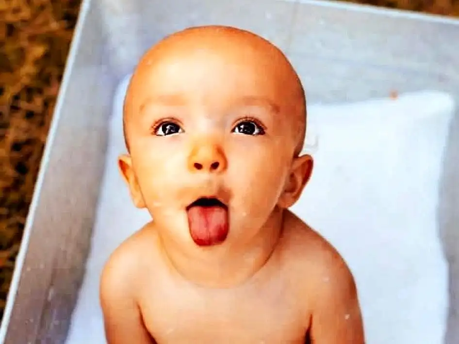 Face, Nose, Cheek, Head, Skin, Lip, Eyebrow, Eyes, Baby Bathing, Mouth, Eyelash, Jaw, Neck, Happy, Iris, Bathing, Baby, Chest, Toddler, Baby Making Funny Faces, Person