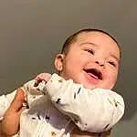 Cheek, Skin, Chin, Smile, Mouth, Human Body, Flash Photography, Neck, Sleeve, Happy, Gesture, Comfort, Finger, Baby & Toddler Clothing, Toddler, Baby, Abdomen, Thumb, Elbow, Child, Person