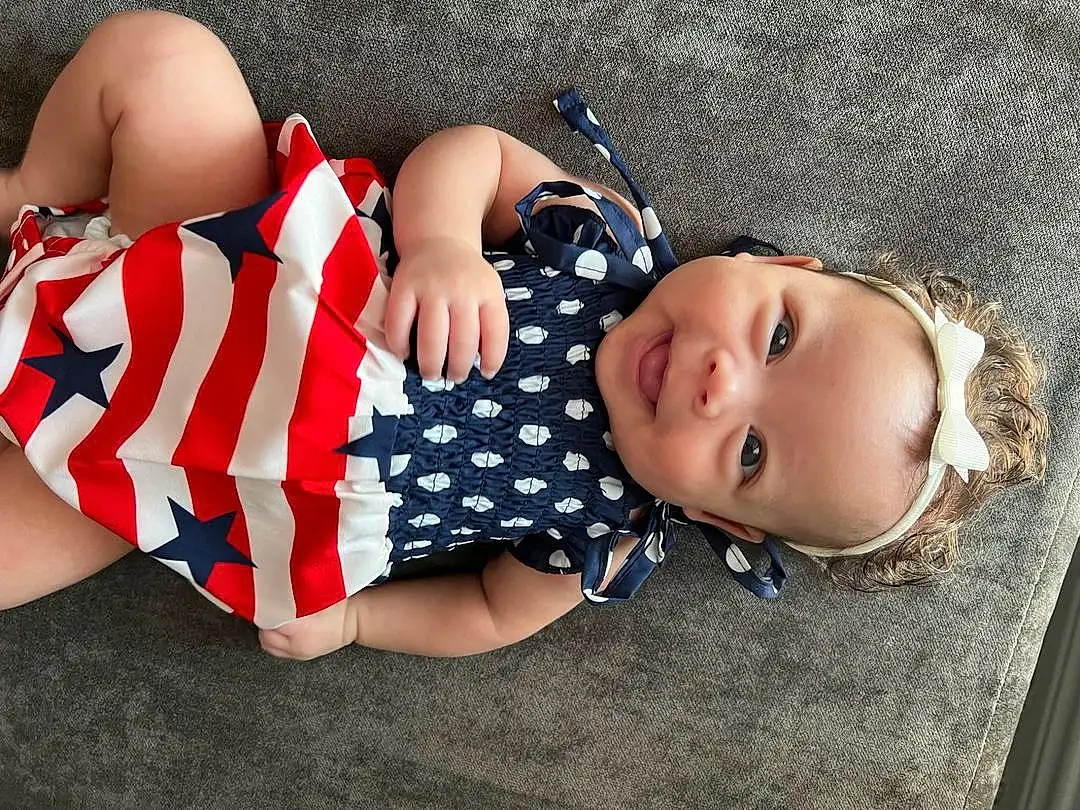 Human Body, Sleeve, Baby & Toddler Clothing, Thigh, Toddler, Comfort, Happy, Pattern, Human Leg, Elbow, Knee, Child, Wrist, Baby, Nail, Fashion Accessory, Foot, Carmine, Sitting, Flag Of The United States, Person, Joy