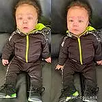 Face, Cheek, Skin, Outerwear, Eyes, Facial Expression, Green, Baby & Toddler Clothing, Sleeve, Standing, Gesture, Baby, Toddler, Fun, Jacket, Collar, Comfort, Happy, Child, Person, Surprise