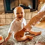 Smile, Leg, Orange, Flash Photography, Wood, Happy, Toddler, Baby, Hardwood, Fun, Baby & Toddler Clothing, Television, Child, Human Leg, Foot, Sitting, Soil, Person, Joy