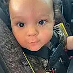 Forehead, Nose, Cheek, Skin, Eyebrow, Mouth, Eyelash, Ear, Iris, Baby, Cool, Car Seat, Seat Belt, Toddler, Vehicle Door, Auto Part, Head Restraint, Child, Baby Products, Person