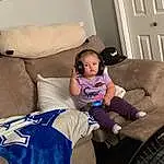 Furniture, Couch, Comfort, Door, Automotive Tire, Pillow, Thigh, Living Room, Beauty, Toddler, Sock, Leisure, Lap, Human Leg, Throw Pillow, Child, Person