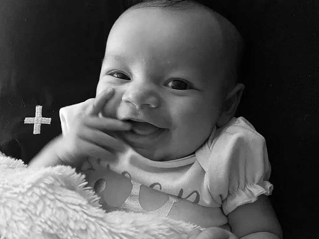 Cheek, Skin, Lip, Hand, Eyebrow, Flash Photography, Baby, Standing, Gesture, Baby & Toddler Clothing, Iris, Comfort, Style, Black-and-white, Finger, Happy, Toddler, Child, People, Monochrome, Person