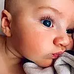 Forehead, Nose, Cheek, Skin, Lip, Chin, Eyebrow, Eyes, Mouth, Eyelash, Neck, Iris, Ear, Baby & Toddler Clothing, Baby, Toddler, Child, No Expression, Close-up, Chest, Person