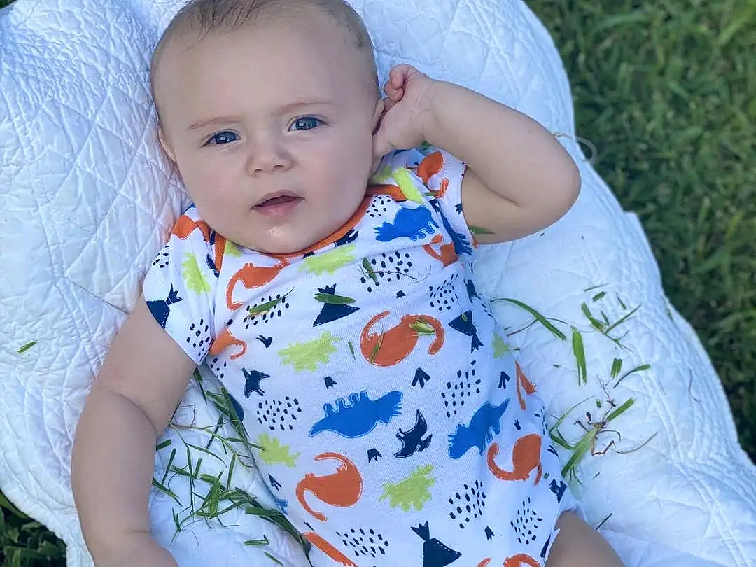 Face, Nose, Skin, Lip, Eyes, Plant, Leg, Leaf, Baby & Toddler Clothing, Human Body, Botany, Dress, Sleeve, Iris, People In Nature, Baby, Happy, Grass, Toddler, Finger, Person