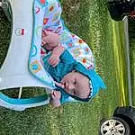 Wheel, Tire, Photograph, Green, Vehicle, Tree, Plant, Car, Grass, Leisure, Toddler, Cool, Fun, Public Space, Automotive Tire, Summer, Vroom Vroom, Vehicle Door, Person, Surprise, Headwear