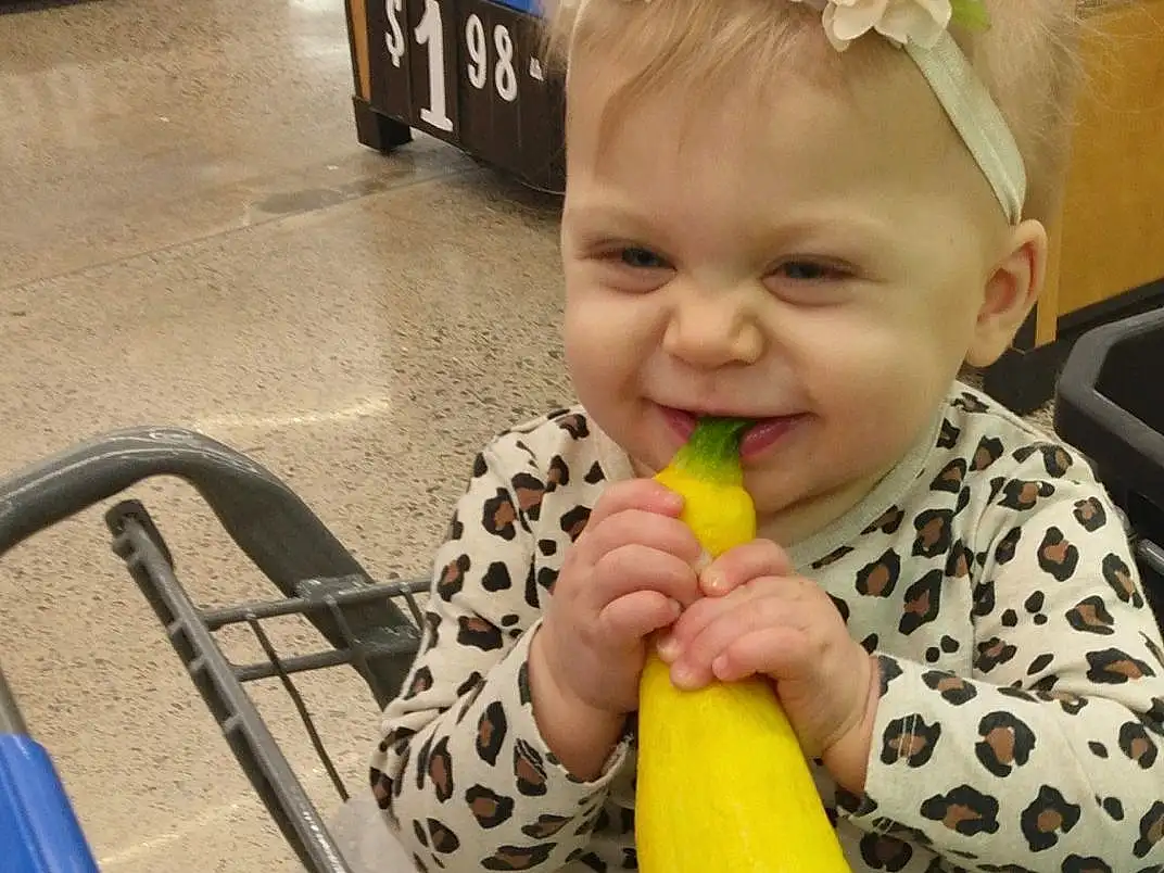Smile, Eyes, Blue, Human Body, Plant, Yellow, Sweet Corn, Baby, Baby & Toddler Clothing, Natural Foods, Toddler, Fun, Vegetable, Child, Happy, Thumb, Gourd, Tire, Squash, Person