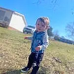 Sky, Plant, Leaf, People In Nature, Standing, Happy, Toddler, Grass, Grassland, Landscape, Tree, Leisure, Electric Blue, Child, Boot, Prairie, Recreation, Spring, Fun, Person