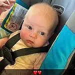 Cheek, Skin, Hairstyle, Facial Expression, Comfort, Baby, Baby Carriage, Baby & Toddler Clothing, Iris, Finger, Car Seat, Toddler, Thigh, Seat Belt, Baby Products, Baby Safety, Sitting, Auto Part, Baby In Car Seat, Person