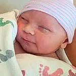 Face, Nose, Cheek, Skin, Head, Lip, Chin, Eyebrow, Facial Expression, Mouth, Comfort, White, Baby Sleeping, Baby, Textile, Baby & Toddler Clothing, Finger, Pink, Toddler, Person, Headwear