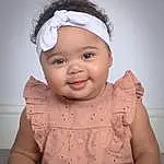 Face, Nose, Cheek, Skin, Lip, Chin, Outerwear, Smile, White, Mouth, Cap, Baby & Toddler Clothing, Neck, Sleeve, Flash Photography, Standing, Iris, Baby, Happy, Gesture, Person, Joy, Headwear