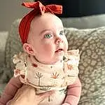 Face, Cheek, Skin, Head, Lip, Chin, Eyes, Mouth, Baby, Human Body, Baby & Toddler Clothing, Textile, Sleeve, Comfort, Stomach, Iris, Pink, Toddler, Child, Happy, Person
