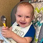 Face, Cheek, Head, Smile, Tableware, Kitchen Utensil, Dishware, Baby, Plate, Finger, Cutlery, Baby & Toddler Clothing, Happy, Toddler, Serveware, Child, Spoon, Drinkware, Fork, Comfort, Person, Joy