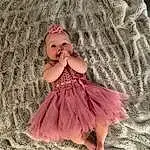 Dress, Baby & Toddler Clothing, Sleeve, Day Dress, Embellishment, One-piece Garment, Pink, Ruffle, Toddler, Magenta, Fashion Design, Pattern, Peach, Blond, Happy, Child, Fashion Accessory, Costume, Bridal Accessory, Headpiece, Person