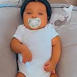 Cheek, Skin, Head, Facial Expression, White, Mouth, Stomach, Comfort, Baby, Baby & Toddler Clothing, Thigh, Toddler, Knee, Trunk, Chest, Abdomen, Thumb, Human Leg, Child, Person