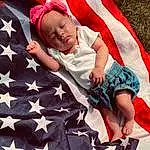Hand, Sleeve, Textile, Comfort, Baby & Toddler Clothing, Gesture, Flag Of The United States, Happy, Toddler, Red, Baby, Child, Fun, Pattern, T-shirt, Linens, Thigh, Event, Electric Blue, Flag Day (usa), Person
