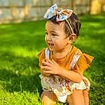 Skin, Smile, Plant, People In Nature, Flash Photography, Happy, Sunlight, Grass, Baby & Toddler Clothing, Toddler, Baby, Grassland, Meadow, Leisure, Fun, Child, Sitting, Fashion Accessory, Headpiece, Headband, Person