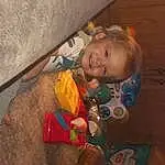 Brown, Cheek, Eyes, Iris, Toddler, Smile, Fun, Child, Wood, Toy, Baby, Room, Packing Materials, Plastic, Sitting, Baby Products, Person, Joy