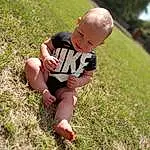 Face, Head, Shorts, Plant, People In Nature, Happy, Baby & Toddler Clothing, Grass, Tree, Baby, T-shirt, Leisure, Toddler, Grassland, Meadow, Landscape, Child, Prairie, Barefoot, Person