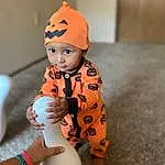 Human Body, Sleeve, Orange, Gesture, Baby & Toddler Clothing, Cap, Baby, Happy, Knee, Toddler, Smile, Costume Hat, Thigh, Child, Foot, Human Leg, Trunk, Personal Protective Equipment, Carmine, Person, Headwear
