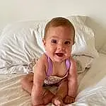 Skin, Smile, Arm, Comfort, Stomach, Baby & Toddler Clothing, Happy, Finger, Baby, Toddler, Linens, Human Leg, Abdomen, Chest, Knee, Bed, Fun, Foot, Child, Sitting, Person