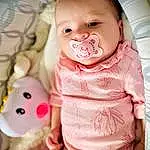 Nose, Cheek, Skin, Lip, Mouth, Eyes, Facial Expression, Stomach, Human Body, Baby & Toddler Clothing, Dress, Pink, Iris, Baby, Finger, Happy, Toddler, Thigh, Comfort, Nail, Person