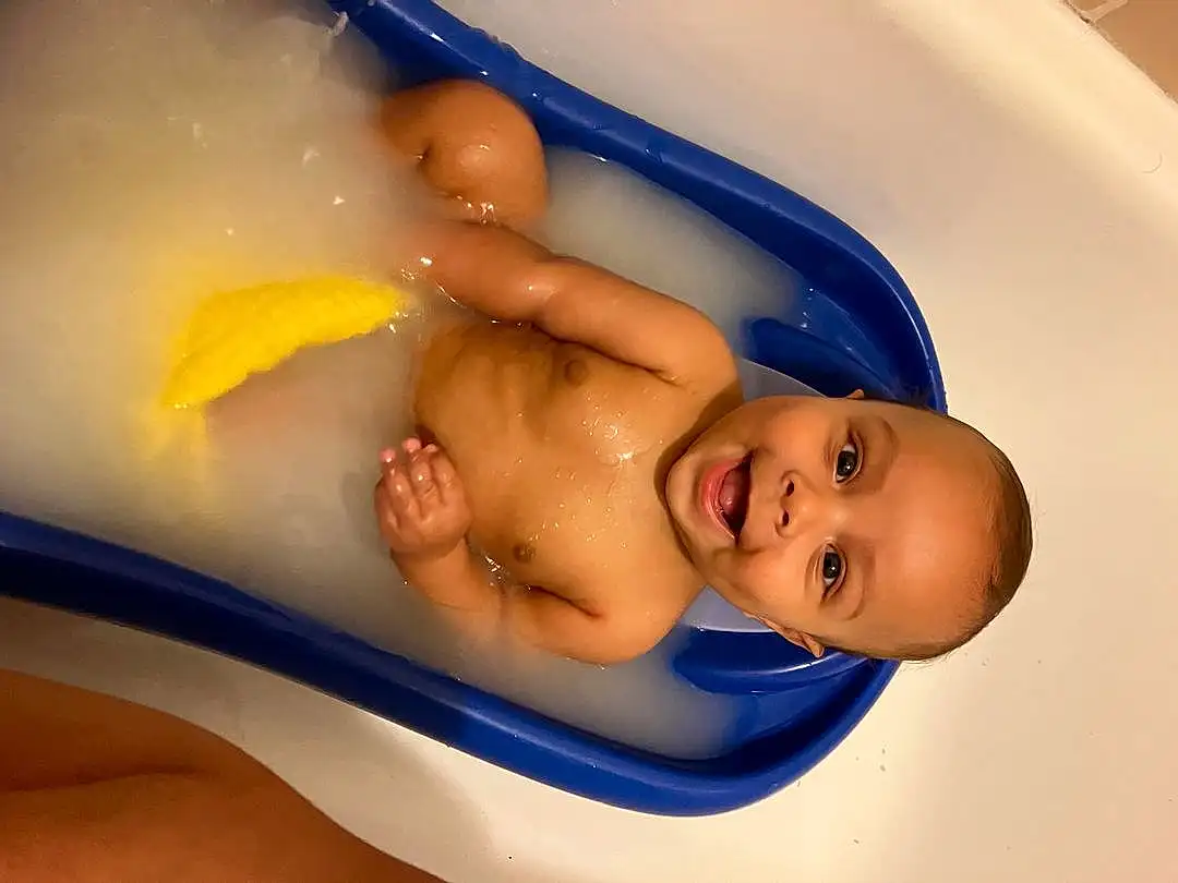 Baby Bathing, Bathtub, Water, Fluid, Ear, Bathroom, Bathing, Plumbing Fixture, Finger, Stomach, Liquid, Baby, Chest, Plumbing, Bath Toy, Fun, Toddler, Leisure, Personal Care, Baby Products, Person