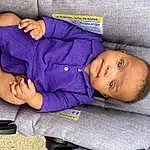 Facial Expression, Comfort, Purple, Gesture, Baby & Toddler Clothing, Finger, Baby, Violet, Toddler, Smile, Electric Blue, Child, Baby Products, Thumb, Car Seat, Lap, Sitting, Sleep, Person