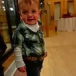 Smile, Sleeve, Toddler, Happy, Baby & Toddler Clothing, Waist, Wood, Denim, Child, Baby, Fun, Hardwood, Sitting, Leather Jacket, Furry friends, Bag, Abdomen, Luggage And Bags, Leather, Person, Joy