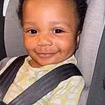 Nose, Cheek, Skin, Smile, Sleeve, Baby Carriage, Baby, Cool, Toddler, Eyelash, Happy, Car Seat, Child, Seat Belt, Comfort, Baby Products, Fun, Steering Wheel, Sitting, Person, Joy
