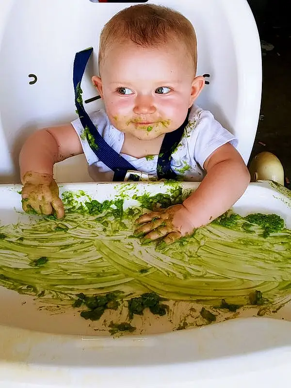 Food, Baby & Toddler Clothing, Recipe, Baby, Happy, Hat, Leaf Vegetable, Ingredient, Toddler, Grass, Vegetable, Produce, Child, Dish, Sun Hat, Comfort Food, Wild Cabbage, Superfood, Cruciferous Vegetables, Floral Design, Person