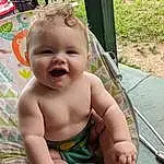 Cheek, Skin, Head, Eyes, Smile, Baby, Plant, Finger, Toddler, Happy, Grass, Leisure, Fun, Thumb, Chest, Thigh, Baby & Toddler Clothing, Sitting, Barechested, Child, Person