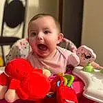 Cheek, Skin, Arm, Toy, Baby, Happy, Baby Playing With Toys, Smile, Baby & Toddler Clothing, Toddler, Child, Baby Products, Fun, Sweetness, Riding Toy, Comfort, Baby Toys, Play, Event, Stuffed Toy, Person, Surprise