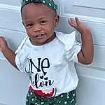 Facial Expression, White, Green, Sleeve, Baby & Toddler Clothing, T-shirt, Gesture, Happy, Cool, Toddler, Cap, Child, Eyewear, Pattern, Baby, Fun, Fashion Accessory, Top, Play, Person