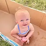 Face, Cheek, Smile, Skin, Water, Toddler, Baby, Finger, Happy, Leisure, Grass, Fun, Child, Bathing, Recreation, Sitting, Baby Products, Vacation, Play, Baby & Toddler Clothing, Person, Joy