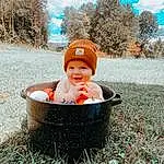 Cloud, Sky, People In Nature, Plant, Leaf, Tree, Baby, Toddler, Grass, Snow, Happy, Fun, Winter, Freezing, Sitting, Child, Baby & Toddler Clothing, Cap, Leisure, Fruit, Person, Joy, Headwear
