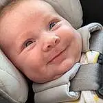 Nose, Face, Cheek, Skin, Smile, Lip, Eyebrow, Mouth, Cap, Comfort, Baby, Iris, Flash Photography, Happy, Toddler, Finger, Baby & Toddler Clothing, Child, Fun, Baby Products, Person, Joy