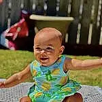 Skin, Smile, Baby & Toddler Clothing, Happy, Leisure, Grass, Toddler, Fun, Baby, Recreation, Child, Event, Sitting, Play, T-shirt, Barefoot, Foot, Sandal, Vacation, Pattern, Person