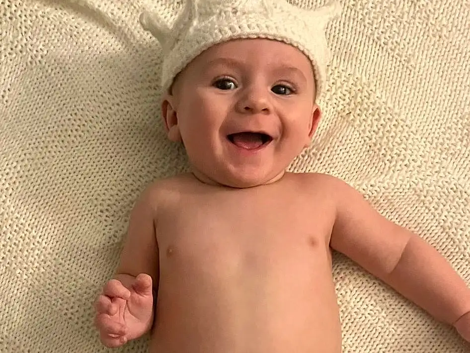 Face, Cheek, Skin, Smile, Lip, Stomach, Eyes, Mouth, Diaper, Baby, Happy, Thigh, Pink, Baby & Toddler Clothing, Thumb, Chest, Trunk, Toddler, Comfort, Abdomen, Person, Headwear