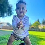 Head, Hand, Sky, Smile, Leg, Green, Plant, Flash Photography, People In Nature, Happy, Grass, Gesture, Baby & Toddler Clothing, Sunlight, Tree, Finger, Toddler, Morning, Summer, Grassland, Person, Joy
