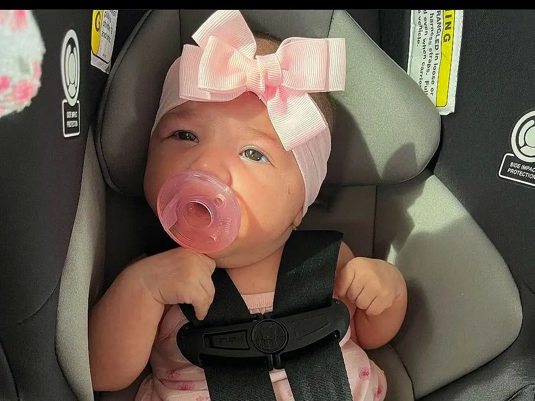 Comfort, Kitchen Utensil, Pink, Car Seat, Baby, Seat Belt, Auto Part, Toy, Toddler, Baby Carriage, Baby & Toddler Clothing, Thumb, Car Seat Cover, Baby Products, Carmine, Cutlery, Head Restraint, Fashion Accessory, Sitting, Child