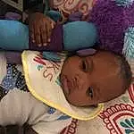 Forehead, Nose, Hair, Cheek, Skin, Chin, Hand, Arm, Eyes, Mouth, Textile, Iris, Baby, Baby & Toddler Clothing, Toddler, Comfort, Child, Room, Baby Products, Linens, Person