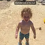 Smile, Beach, People On Beach, Body Of Water, People In Nature, Toddler, Fun, Sand, Happy, Barechested, Shore, Soil, Shorts, Child, Coast, Leisure, Rock, Play, Landscape, Ocean, Person, Joy