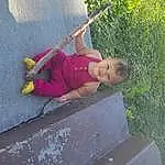 Leisure, Baby & Toddler Clothing, Toddler, Grass, Concrete, Plant, Baby, Fun, Asphalt, Road Surface, Sidewalk, Magenta, Thigh, Sitting, Recreation, Play, Child, People In Nature, Person, Joy